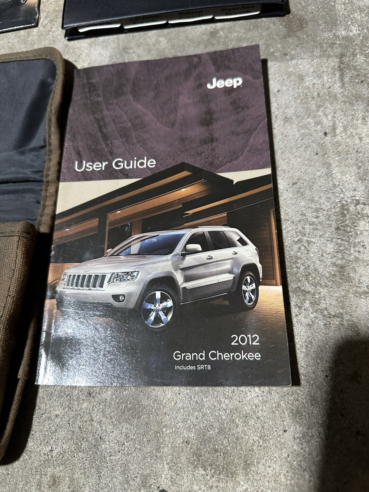 2012 Jeep Grand Cherokee Owners Manual with supplements, DVD and case