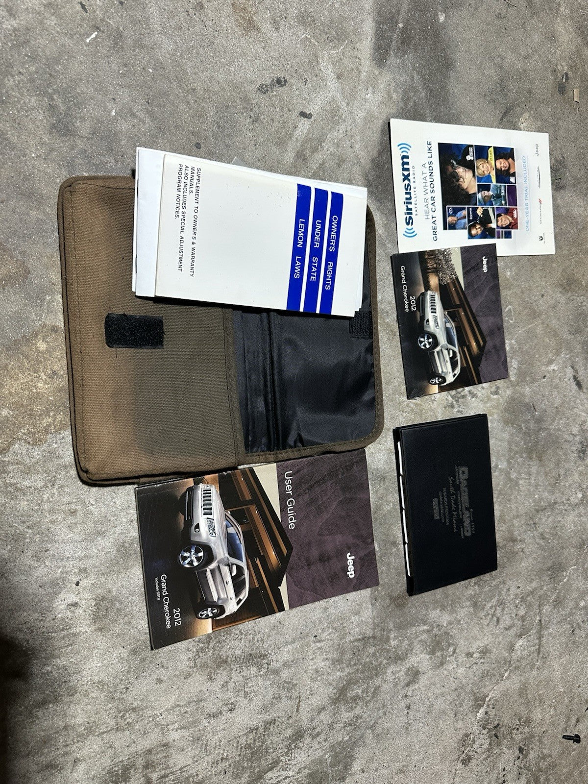 2012 Jeep Grand Cherokee Owners Manual with supplements, DVD and case