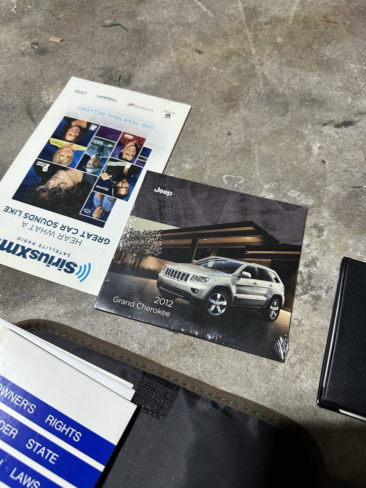 2012 Jeep Grand Cherokee Owners Manual with supplements, DVD and case