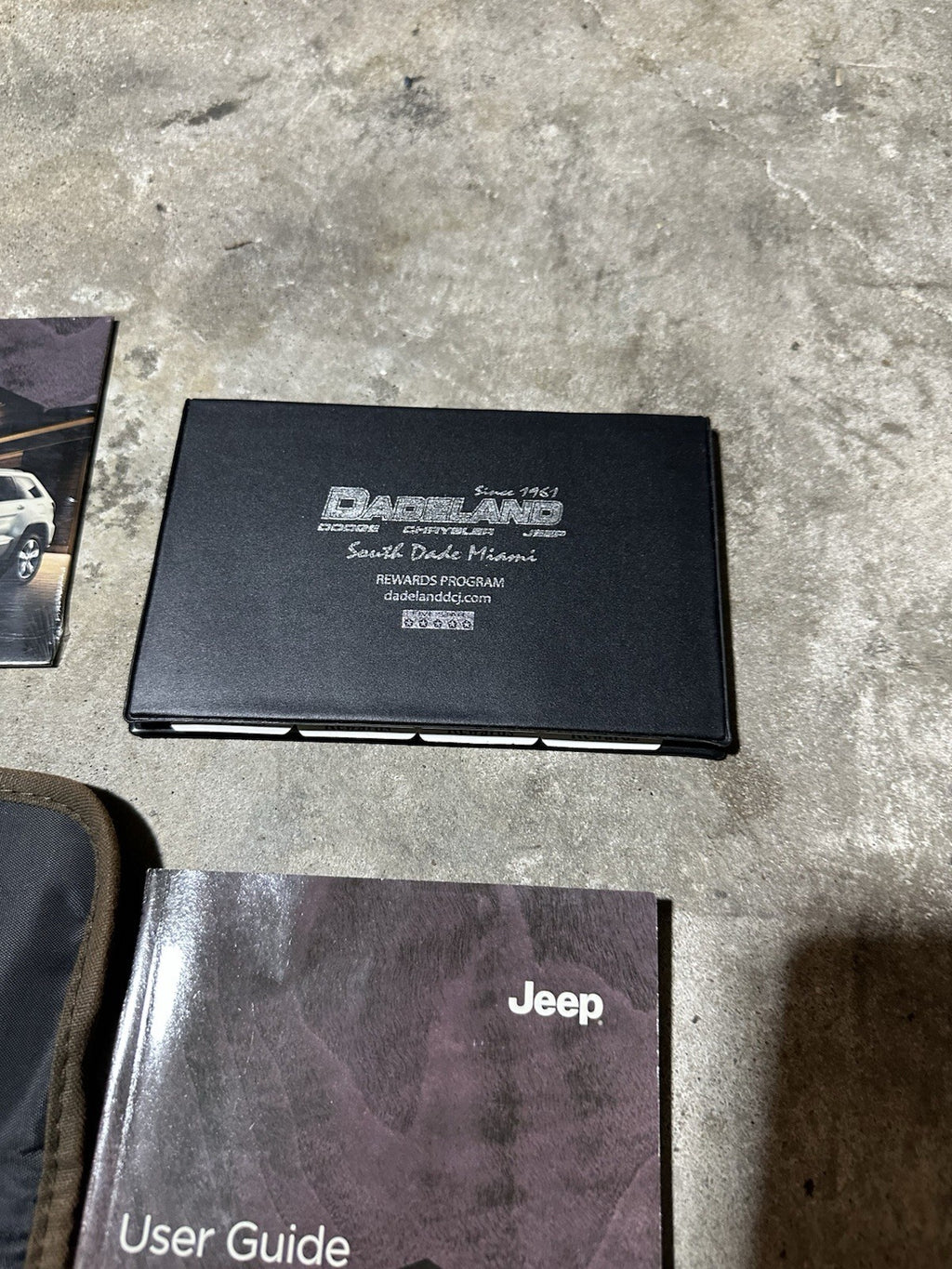 2012 Jeep Grand Cherokee Owners Manual with supplements, DVD and case